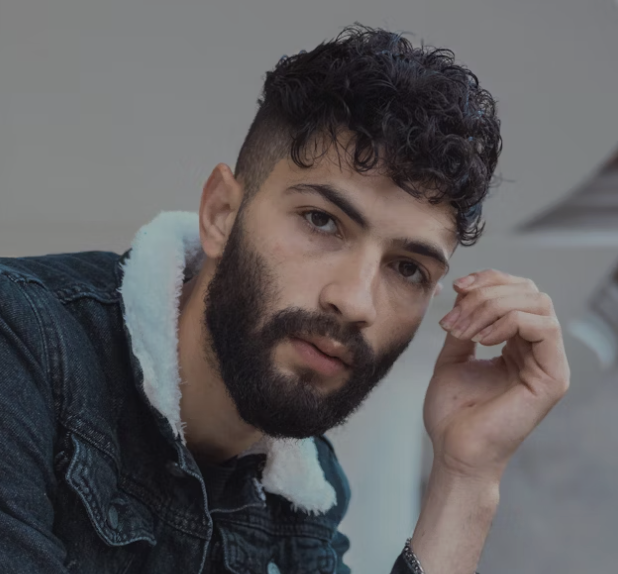 Bearded man denim jacket portrait
